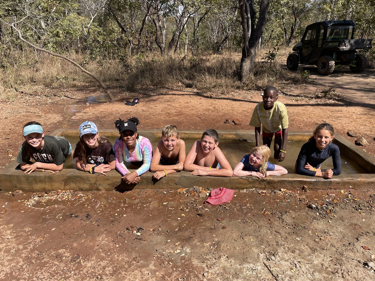 Grade 5 pupils in the dam at Firefly Eco Lodge