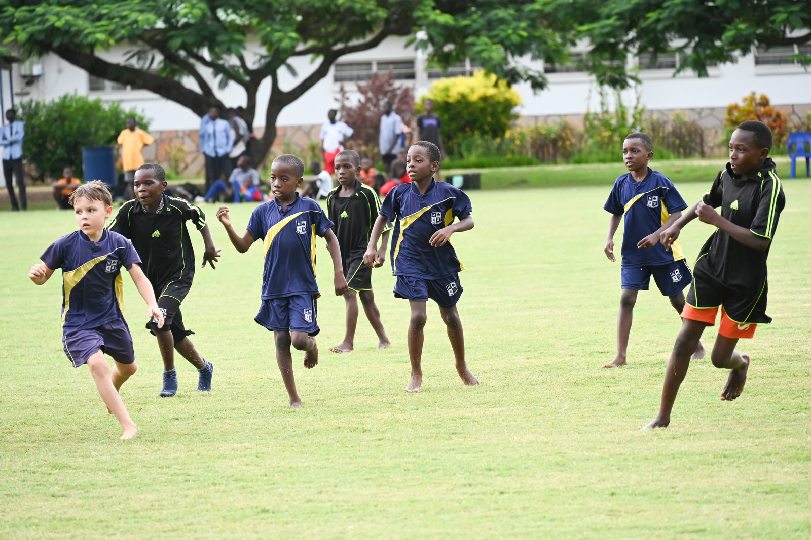 Children running on the school field