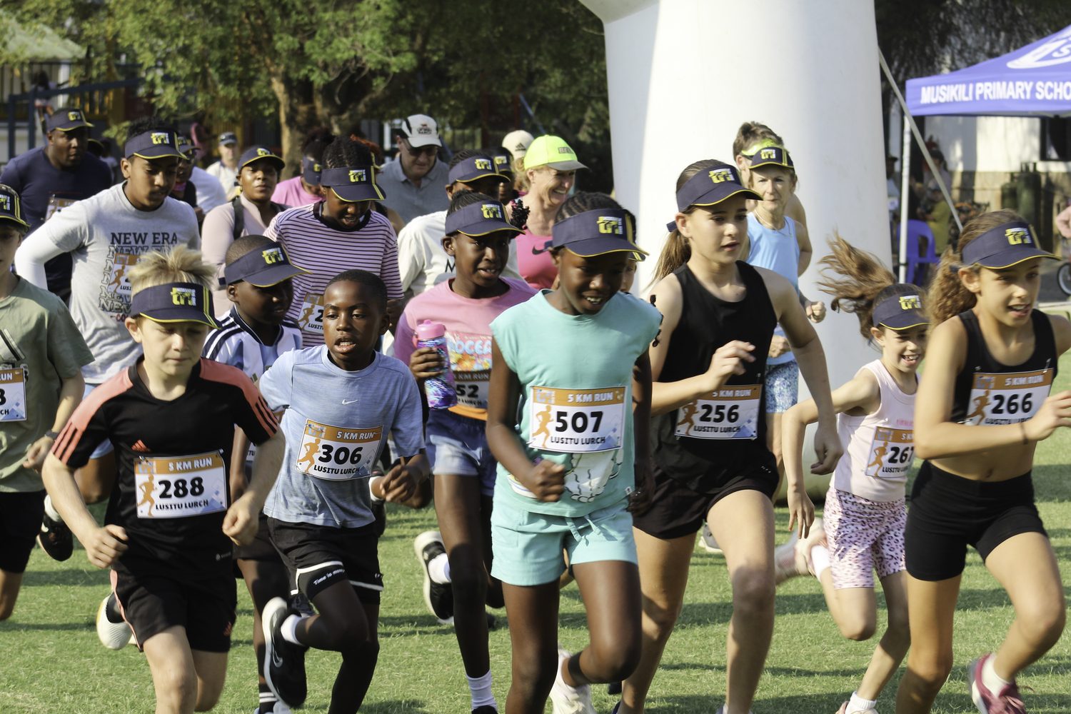 Runners setting off on the 5 km run at the Musikili triathlon